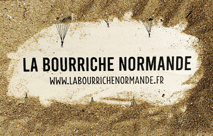 Couvercle de la bourriche normande sous le sable